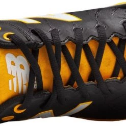 New Balance L4040v5 Low Cut Metal Cleat - Black Yellow 9 New Balance L4040v5 Low Cut Metal Cleat - Black Yellow